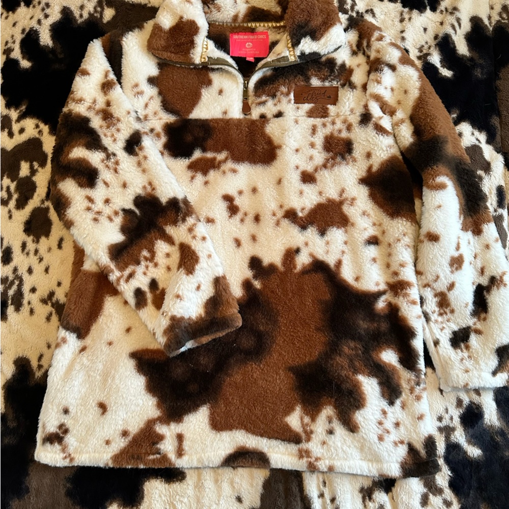 Cowprint Sherpa half zip pullover